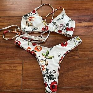 Cute two piece flower pattern bikini with very cheeky bottoms